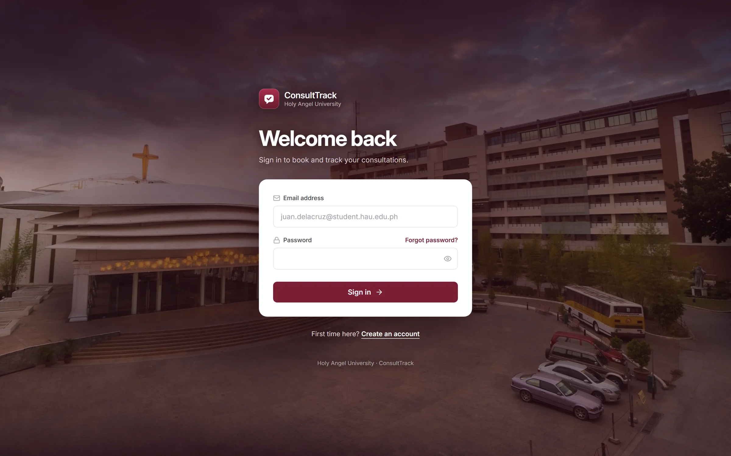 ConsultTrack sign-in screen with the sign-in form centred over a photograph of the Holy Angel University campus.